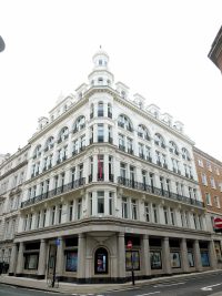 The ornate white facade of Christie's auction house building in London