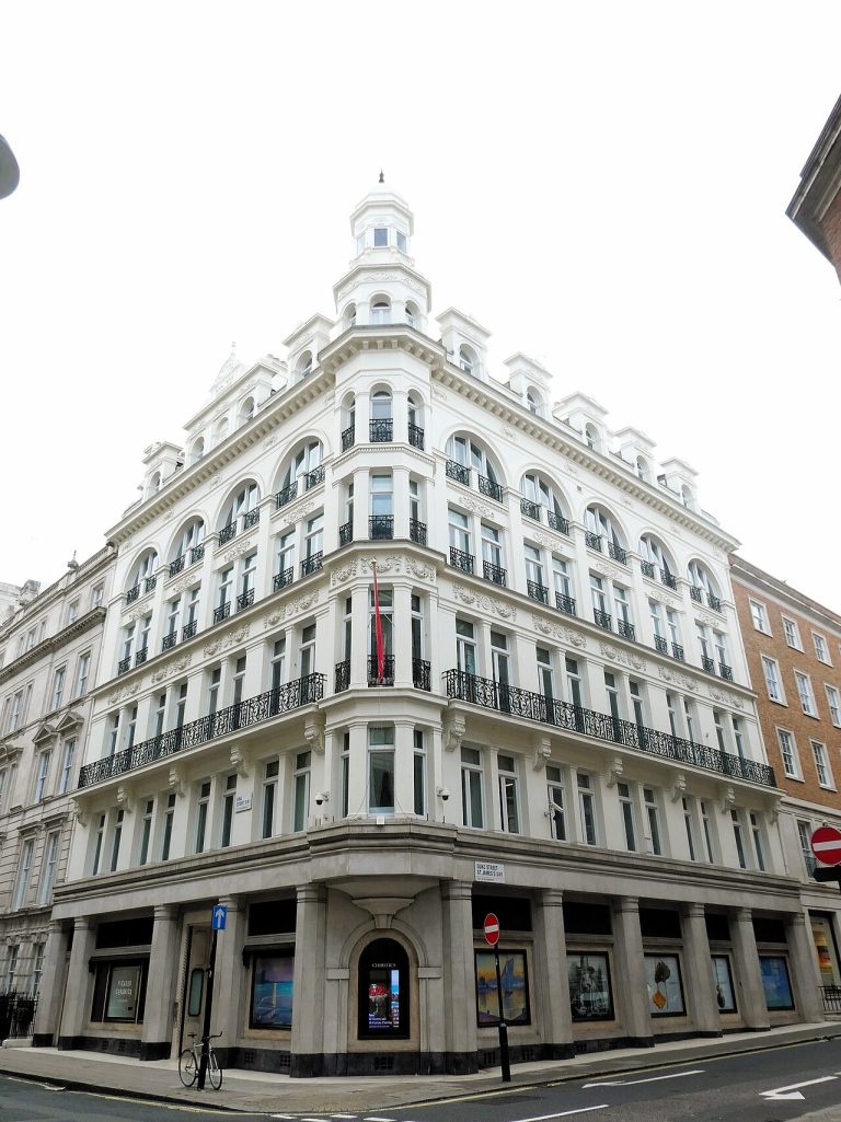 The ornate white facade of Christie's auction house building in London