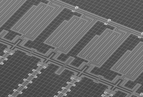 An extreme close-up microscope image of a superconducting quantum chip circuit pattern
